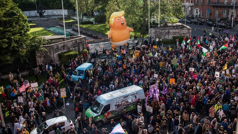 Crowds gather outside the Garden of Rememberance on Parnell Street in Dublin for the anti-Trump protest. Photograph: James Forde