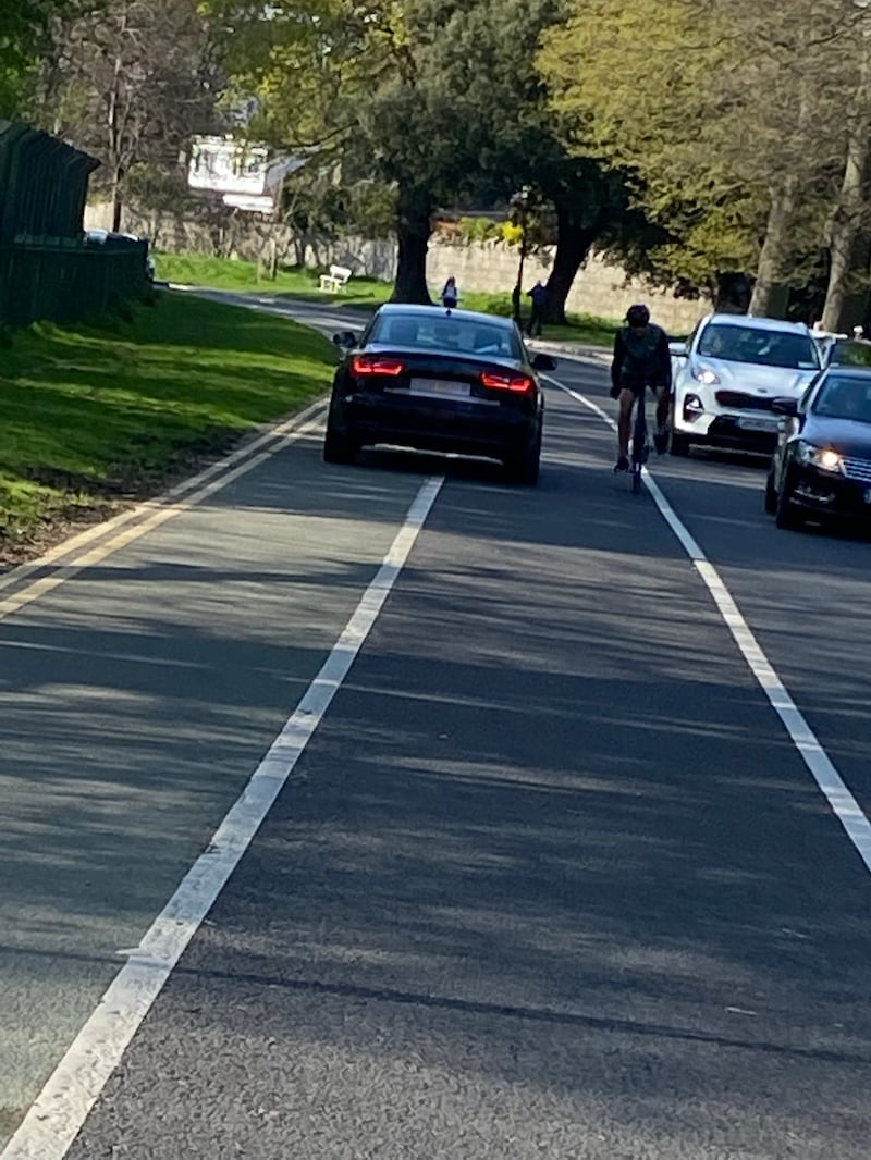 A driver uses the cycle path to drive against traffic on North Road in the Phoenix Park. Photograph: Olivia Kelly