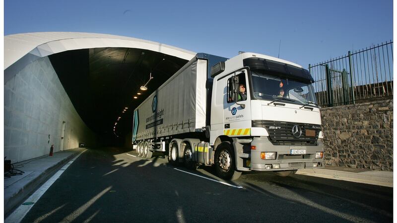 The first truck emerges from the newly opened Dublin Port Tunnel after the official opening ceremony. Photograph: Alan Betson