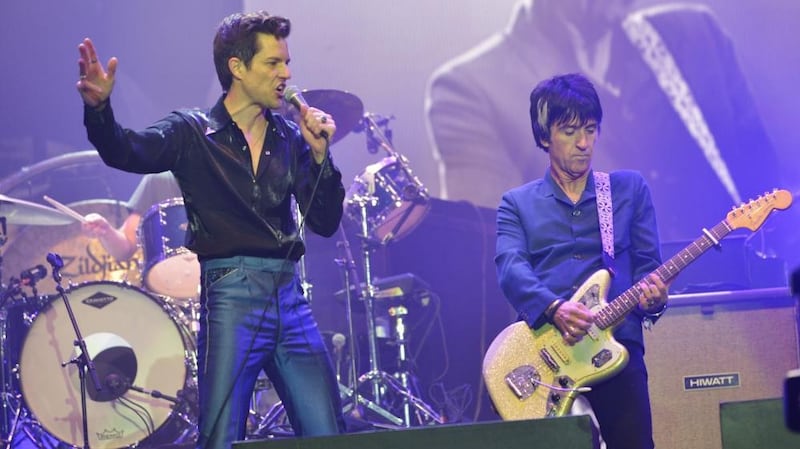 Brandon Flowers (left) with former Smiths guitarist Johnny Marr at Glastonbury. Photograph: Jim Dyson/Getty Images
