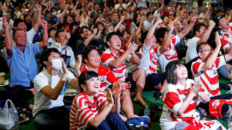 Fans react in a fanzone in Hamamatsu as the Japanese team scores a try against  Russia. Photograph: Adrian Dennis/AFP/Getty Images