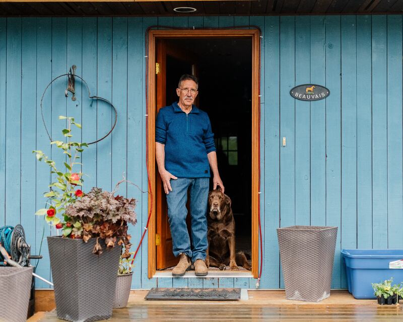 Richard Beauvais at home with his dog, Sam. 'The Native thing was something that I had, that nobody could take away, I guess,' he says. Photograph: Alana Paterson/The New York Times
                      