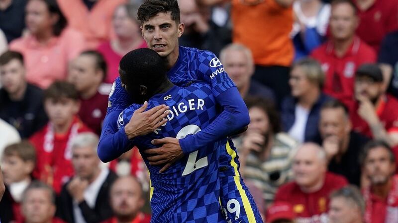 Chelsea’s Kai Havertz celebrates with team-mate Antonio Rüdiger after opening the scoring at Anfield. Photograph:  Andrew Yates/EPA