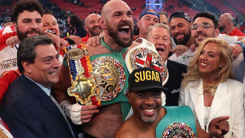 Tyson Fury celebrates victory after retaining his world title against Dillian Whyte  at Wembley Stadium. Photograph: Julian Finney/Getty Images