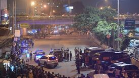 Suspected suicide bombers kill police officers in Jakarta