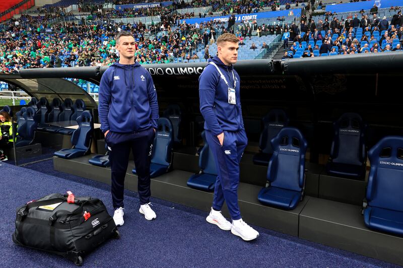Garry Ringrose and Johnny Sexton watch on at the Stadio Olimpico. Photograph: Billy Stickland/Inpho
