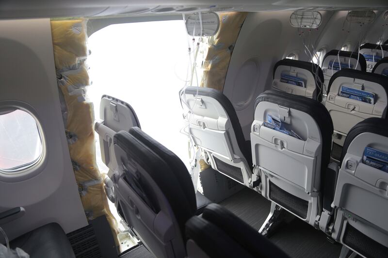A section of Alaska Airlines Flight 1282 that is missing a panel on a Boeing 737-9 Max in Portland, Oregon. Photograph: NTSB/AP