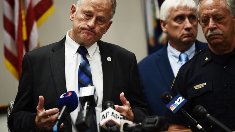 Virginia Beach city manager Dave Hansen with Virginia Beach police chief James Cervera (right), speaks to reporters  on Saturday. Photograph: Getty