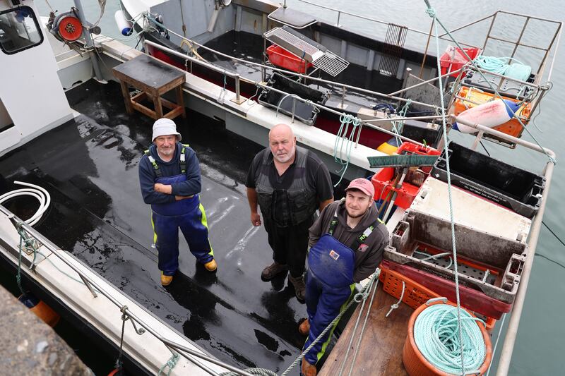 Fishermen Peter Ryan, Franz Schutte and Sean Ryan.  Photograph: Nick Bradshaw