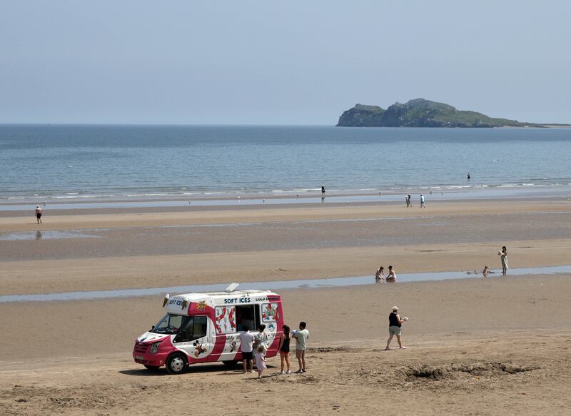 Pictured this afternoon enjoying the sun on Portmarnock Beach, Dublin. Photograph: Colin Keegan, Collins.