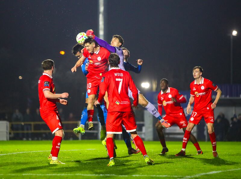 Shelbourne's Wessel Speel gets to the ball ahead Waterford FC's John Mahon. Photograph: Inpho