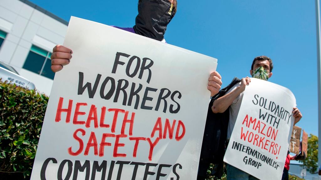 Workers at the Amazon delivery hub in Hawthorne, California protest on May 1st against the failure of employers to provide adequate protection against the coronavirus . Photograph: Valerie Macon/AFP via Getty Images