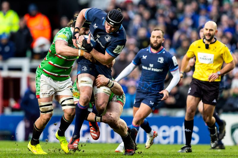 James Ryan of Leinster is tackled by Leicester's Ollie Chessum. Photograph: Juan Gasparini/Inpho
