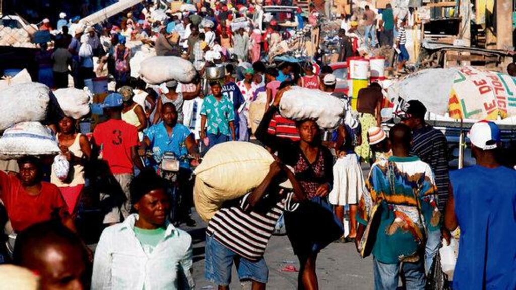Survivors of Haiti's earthquake fill the streets of Port-au-Prince yesterday. Photograph: Eliana Aponte/Reuters