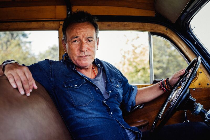 Bruce Springsteen in his 1948 Ford woodie on his property in Colt’s Neck, New Jersey in 2017. Photograph: Bryan Derballa/ The New York Times