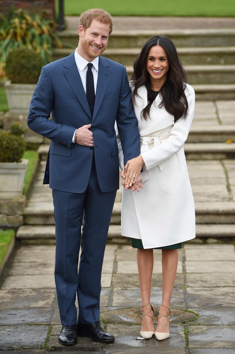 Prince Harry and actress Meghan Markle during an official photocall to announce their engagement in London. Photograph:Eddie Mulholland-WPA Pool/Getty Images