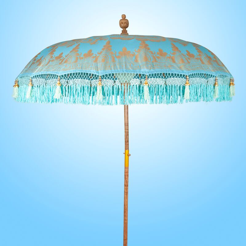 Blue turquoise Balinese artisanl parasol with turquoise fringing, €315, Baliparasol.com
