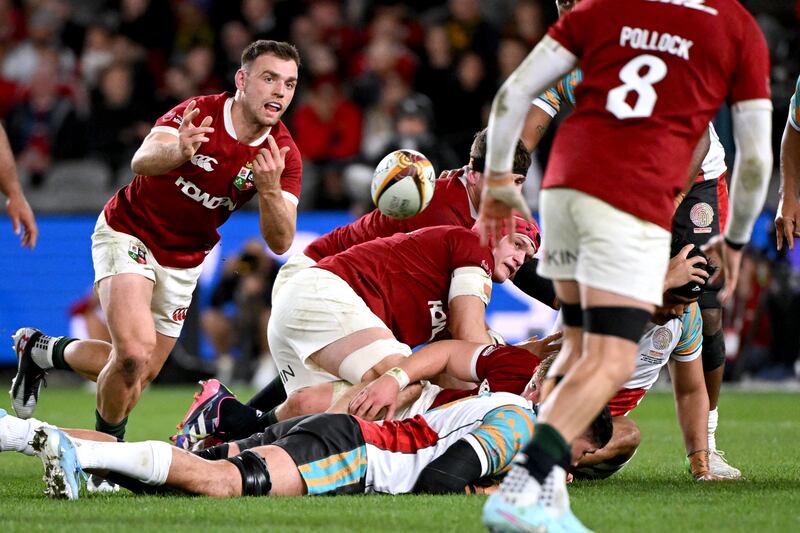 British and Irish Lions scrumhalf Ben White passes from a ruck during the game in Melbourne. Photograph: William West/AFP via Getty Images