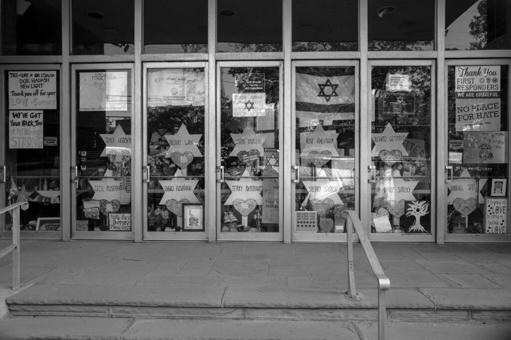 Spencer Ostrander's photographs of locations of mass killings, such as the one above, are "gravestones of our collective grief", writes Paul Auster.