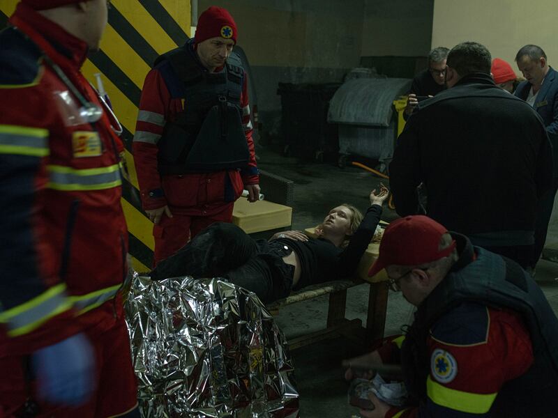Medics treating the wounded after a Russian attack in Kharkiv on Saturday. Photograph: Laura Boushnak/The New York Times
                     
