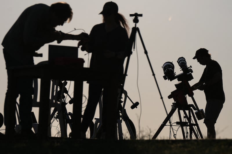 Researchers from San Francisco's Exploratorium museum carry out preparations for the global live broadcast of the solar eclipse, in the abandoned village of Villalibado, near Burgos, northern Spain, on Sunday. Photograph: Cesar Manso/AFP via Getty