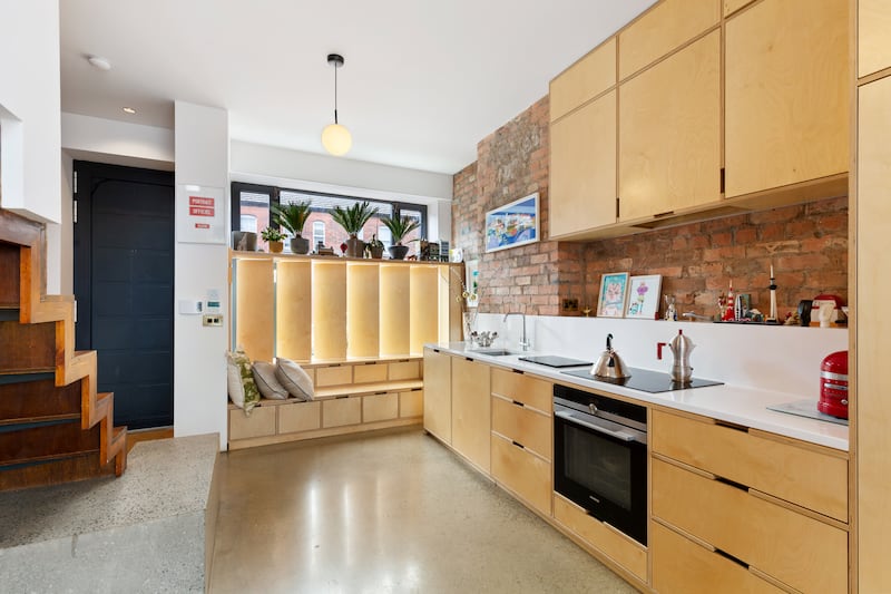 Entrance and kitchen. Photograph: Viv van der Holst