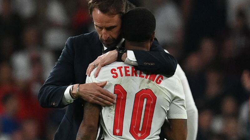 England’s coach Gareth Southgate embraces England forward Raheem Sterling after the Euro 2020 final at Wembley Stadium in London. Photograph: Paul Ellis/Pool/AFP via Getty Images