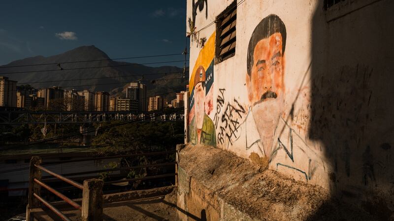 A discoloured mural of Nicolas Maduro in the working-class Petare neighbourhood of Caracas. Photograph: Adriana Loureiro Fernandez/The New York Times