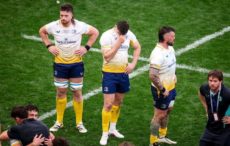 Leinster's Joe McCarthy, Dan Sheehan and Andrew Porter dejected after the Champions Cup loss. Photograph: Nick Elliott/Inpho