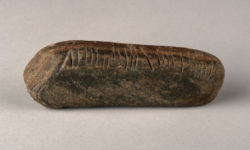 Ogham stone found in garden in Coventry, England Photograph: The Herbert Art Gallery and Museum
