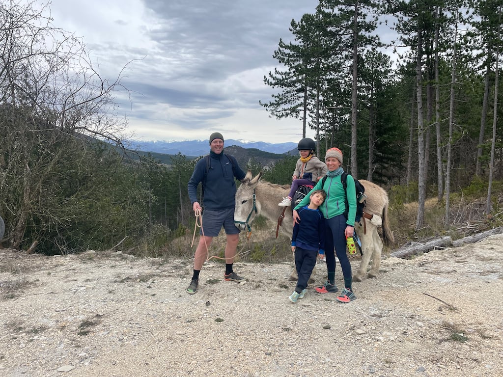 William, Hazel, Myles and Holly Tindal with donkey Zenon above Barret-sur-Méouge, Hautes-Alpes