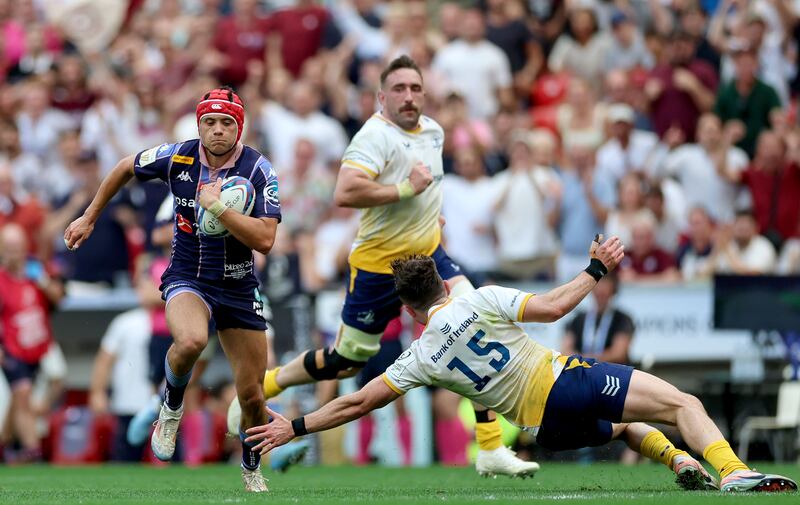 2026 Investec Champions Cup Final, San Mames Stadium, Bilbao, Spain 23/5/2026
Leinster vs Union Bordeaux-Begles
Union Bordeaux Begles' Louis Bielle-Biarrey gets by Leinster's Hugo Keenan to score his sides 4th try of the match
Mandatory Credit ©INPHO/James Crombie