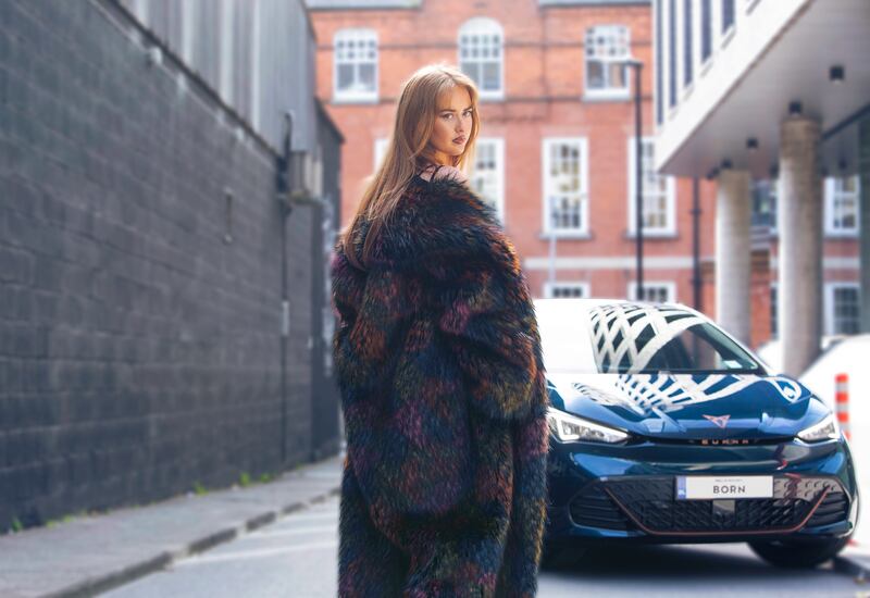 Rachel with one of her signature vegan faux fur coats.