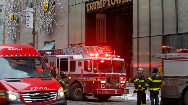 New York Fire Department crew respond after a fire broke out at Trump Tower in Manhattan, New York. Photograph:  REUTERS/Andrew Kelly