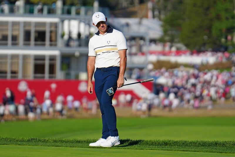Rory McIlroy reacts after missing a putt on the 18th green. Photograph: Mike Stobe/Getty Images