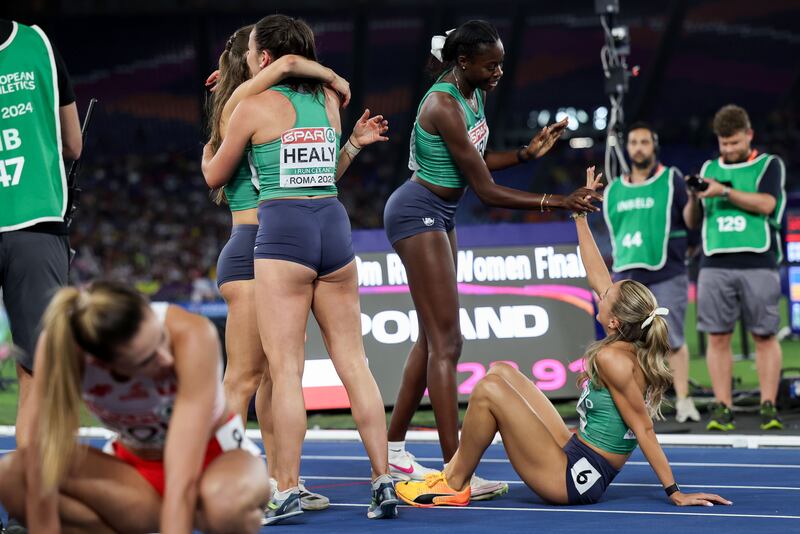 Ireland’s Rhasidat Adeleke, Phil Healy, Sophie Becker and Sharlene Mawdsley celebrate winning silver medals. Photograph: Morgan Treacy/Inpho