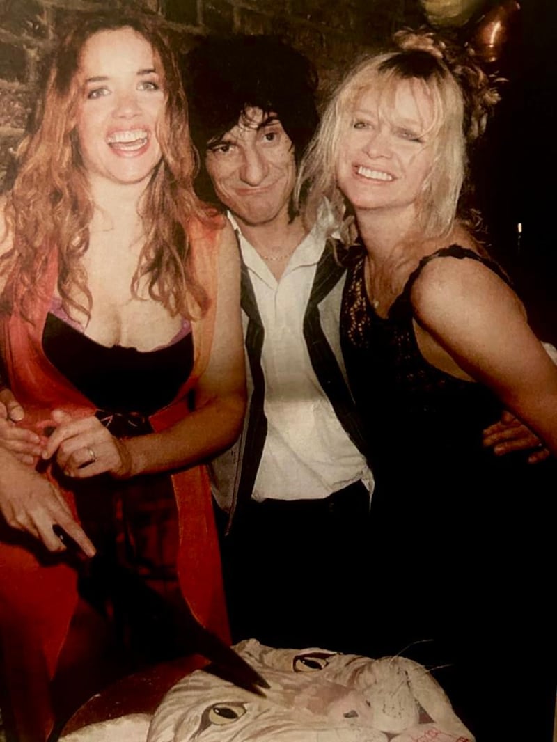 Lize McCarron (left) pictured with Ron Wood and Jo Wood circa 2002. Photograph: Lize McCarron