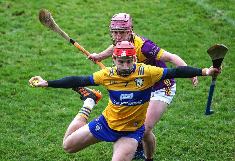 Clare's Darragh Lohan in action against Wexford's James Byrne. Photograph: Bryan Keane/Inpho 