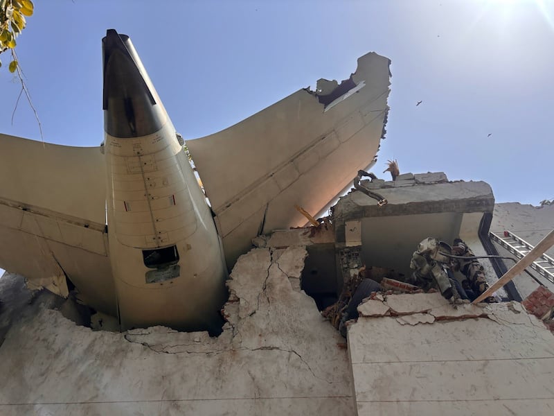 A view of the site after a plane crashed following takeoff from Sardar Vallabhbhai Patel International Airport in India's western state of Gujarati.  (Photo by Central Industrial Security Force / Handout/Anadolu via Getty Images)