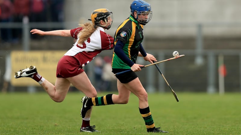 Slaughtneil’s Aoife Cassidy tackles  Jenny Grace of Burgess Duharra (Tipperary) during the All-Ireland senior club camogie semi-final at Iniskeen, Co Monaghan. Photograph: Donall Farmer/Inpho