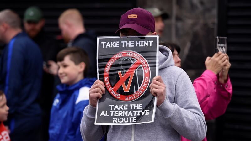 A member of the Greater Ardoyne Residents Coalition GARC expresses his opinion while waiting for the Twelfth of July Orange Order parade  to come down the Crumlin Road in Belfast. Photograph: Clodagh Kilcoyne/Reuters
