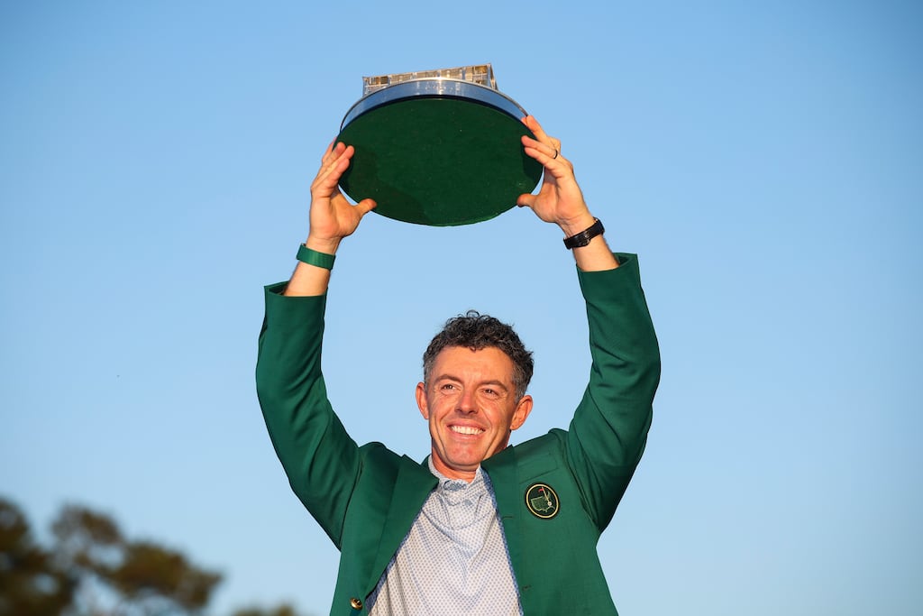 AUGUSTA, GEORGIA - APRIL 12: Rory McIlroy of Northern Ireland lifts the Masters trophy during the Green Jacket Ceremony after winning the final round of the 2026 Masters Tournament at Augusta National Golf Club on April 12, 2026 in Augusta, Georgia. (Photo by Hector Vivas/Getty Images)