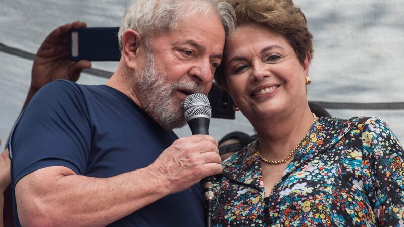 Luiz Inacio Lula da Silva speaks next to Brazilian former president Dilma Rousseff on Saturday.  Photograph: Nelson Almeida/AFP/Getty Images