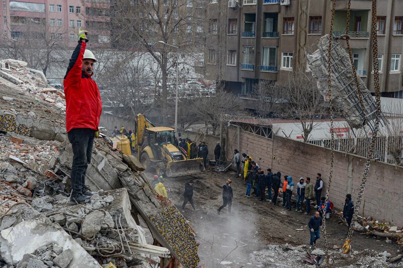 Rescuers search for victims and survivors in Diyarbakir, Turkey. Photograph: Ilyas Akengin/AFP via Getty Images