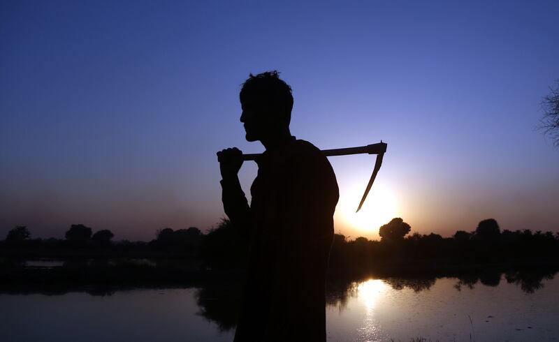 A man driven from his home by flooding in Naushahro Feroze District, Sindh province, Pakistan, in October 2022. 'The proliferation of extreme weather events around the world has only served to emphasise Ireland's geographic good fortune.' Photograph: Rehan Khan/EPA