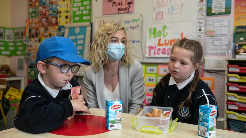Principal Dearbhla Byrne with Cameron McMahon and Lola Mulholland, senior infants pupils at Knockmore junior school in Killinarden, Dublin.  Photograph:  Damien Eagers