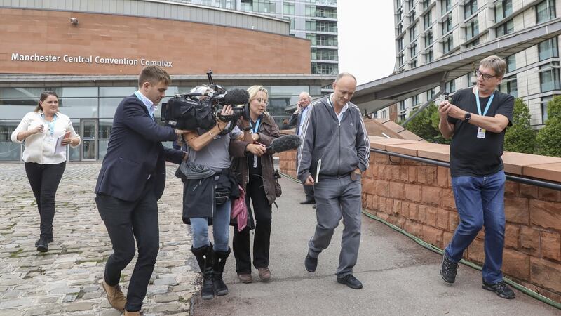 Members of the media surrounding Dominic Cummings at the Conservative Party conference in Manchester last September. Photograph:  Chris Ratcliffe/Bloomberg via Getty Images