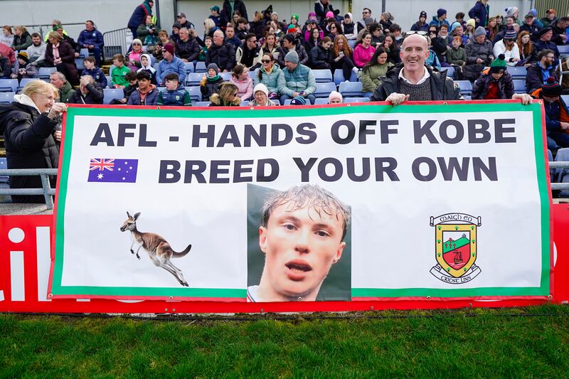 Tom and Pauline McDonald with a banner ahead of Mayo's game against Kerry last month. Photograph: James Lawlor/Inpho
