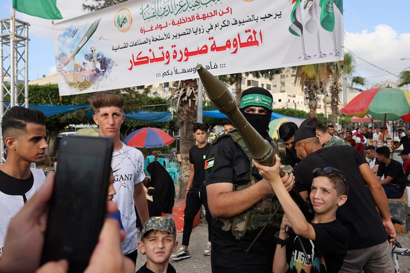 A Palestinian boy poses for a souvenir picture with an RPG launcher during an exhibition by the Ezzedine al-Qassam Brigades, the military wing of the Hamas movement, in Gaza City on June 30th last. Photograph: Mohammed Abed/AFP via Getty Images