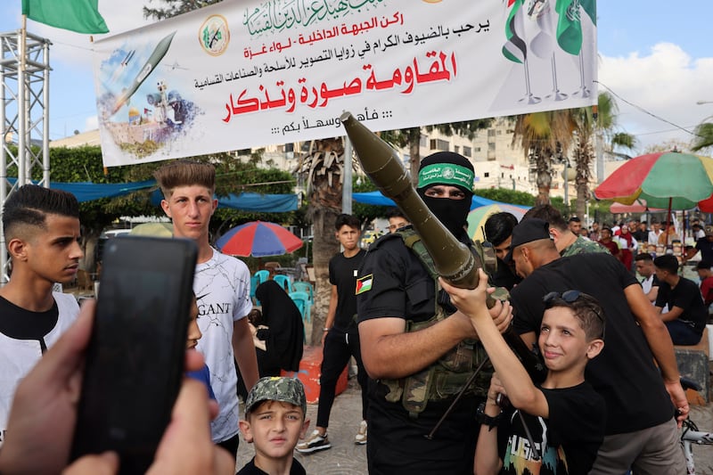 A Palestinian boy poses for a souvenir picture with an RPG launcher during an exhibition by the Ezzedine al-Qassam Brigades, the military wing of the Hamas movement, in Gaza City on June 30th last. Photograph: Mohammed Abed/AFP via Getty Images